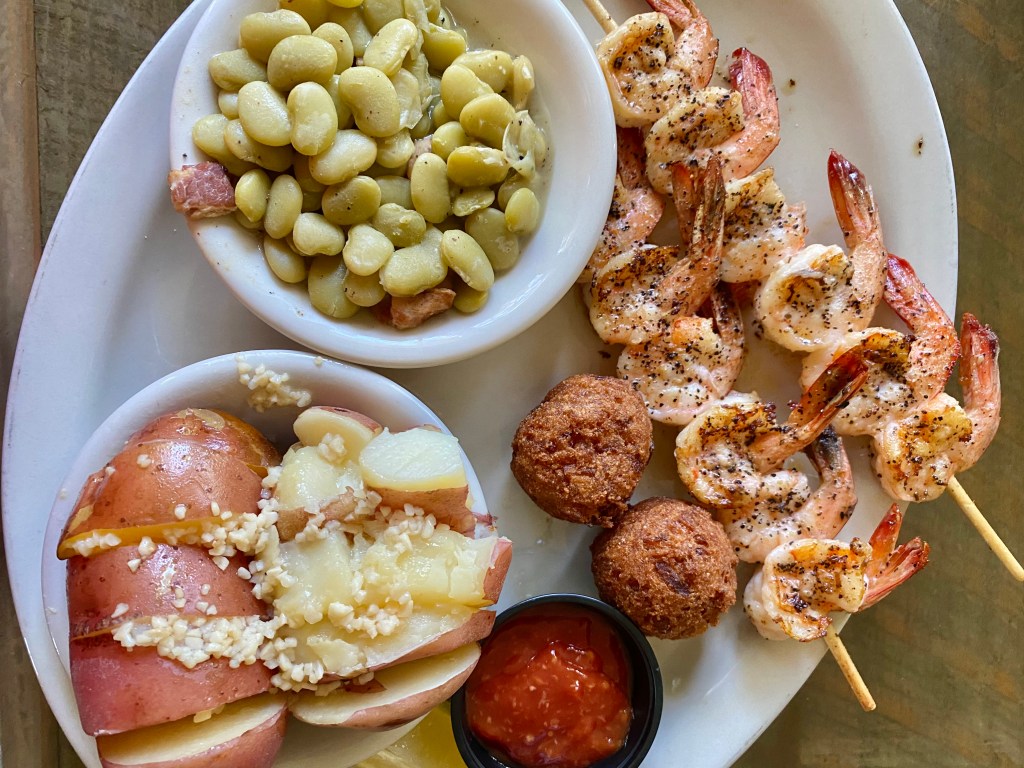 Lunch plate ordered at Zachry's Riverhouse restaurant including: grilled shrimp, buttered potatoes and lima beans with bacon